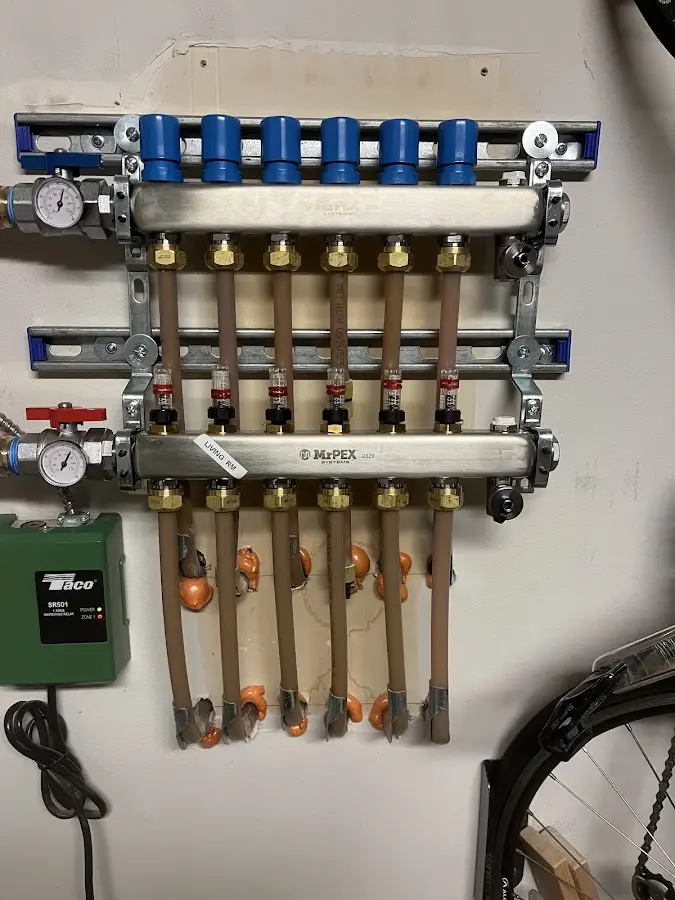 Plumber performing Gas Line Installation at a residential property in Dyersville